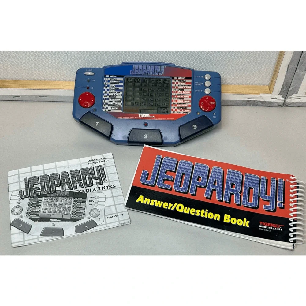 VTG Handheld Jeopardy Electronic Game with Book & Manual Tiger Electronics